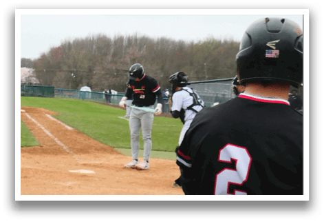A baseball game is taking place on a field. Description generated by AI