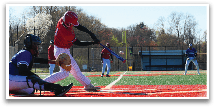 A baseball player is swinging a bat at a ball. Description generated by AI