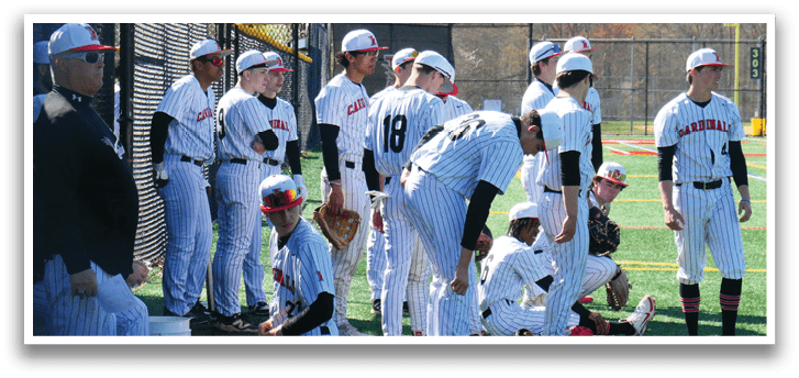 Baseball players wearing black and white uniforms. Description generated by AI