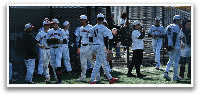 A group of baseball players standing on a field. Description generated by AI