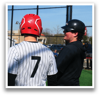 A baseball player wearing a red helmet. Description generated by AI