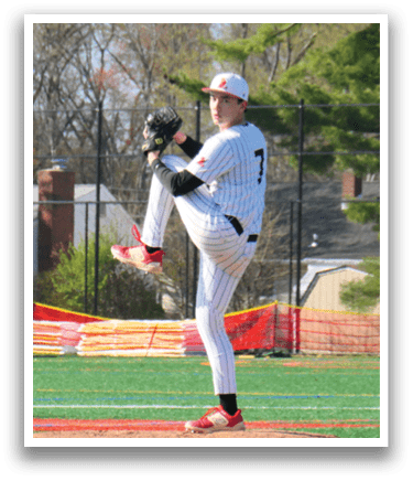 A baseball player in a black and white uniform is pitching a ball. Description generated by AI