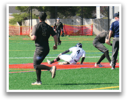 A baseball player slides into a base. Description generated by AI