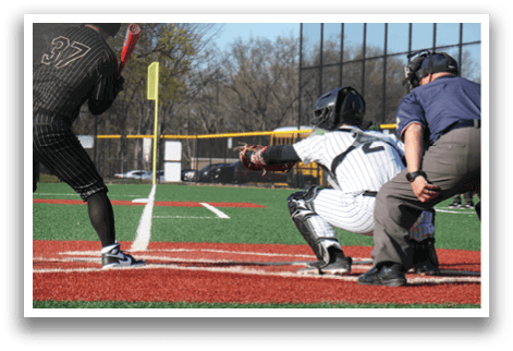 A baseball game is taking place with a batter, catcher, and umpire. Description generated by AI