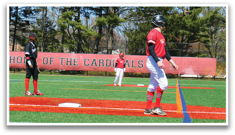 A baseball player is standing on a field with a bat. Description generated by AI