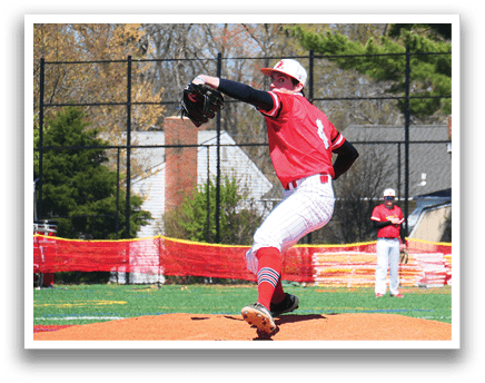 A baseball player in a red shirt and white pants is pitching a ball. Description generated by AI