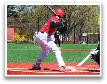 A baseball player is swinging a bat at a ball. Description generated by AI