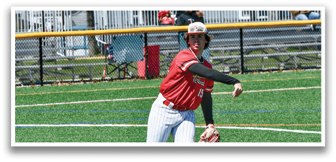 A baseball player in a red shirt and white pants is pitching a ball. Description generated by AI