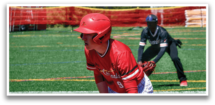 A baseball player wearing a red helmet and red shirt. Description generated by AI