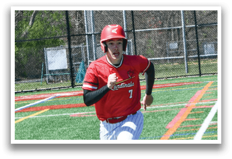 A baseball player running on a field. Description generated by AI