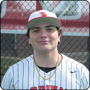 A baseball player wearing a Cardinals jersey. Description generated by AI