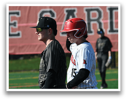 A baseball player wearing a red helmet. Description generated by AI