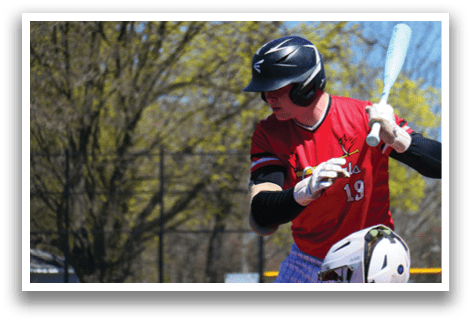 A baseball player is swinging a bat. Description generated by AI