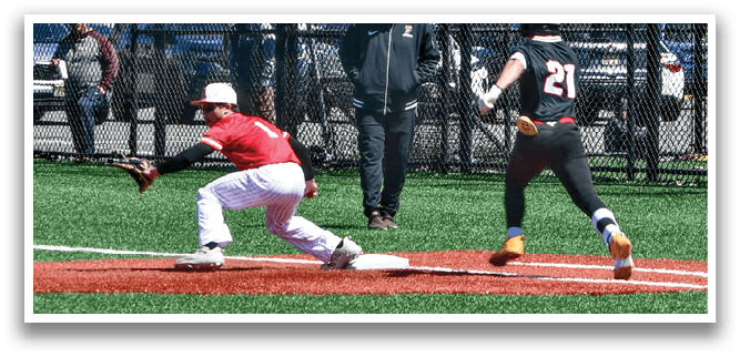 A baseball player sliding into a base. Description generated by AI