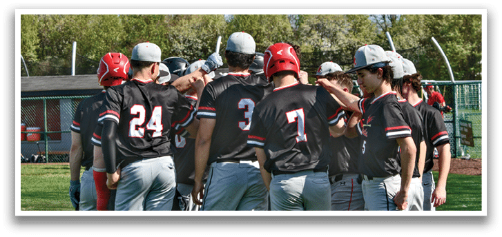 Baseball players wearing black shirts and grey pants. Description generated by AI