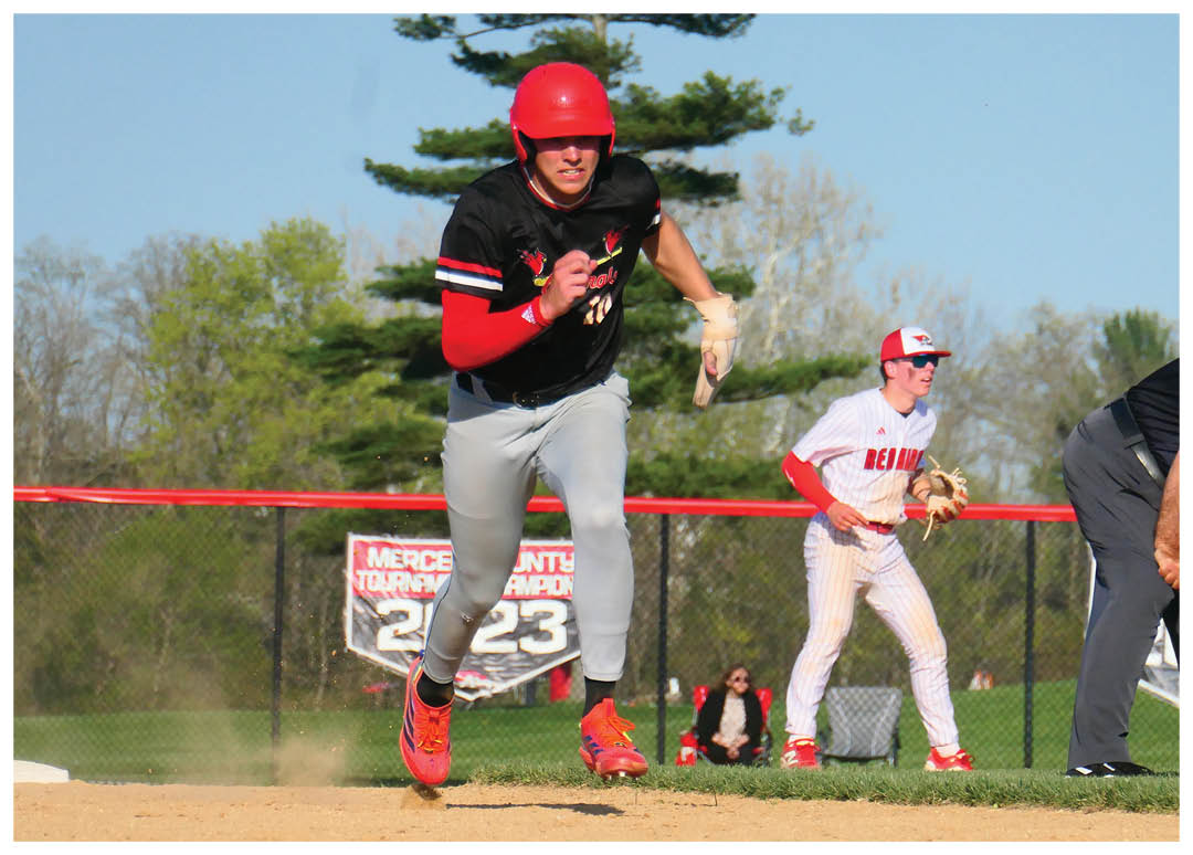 A baseball player running to a base. Description generated by AI