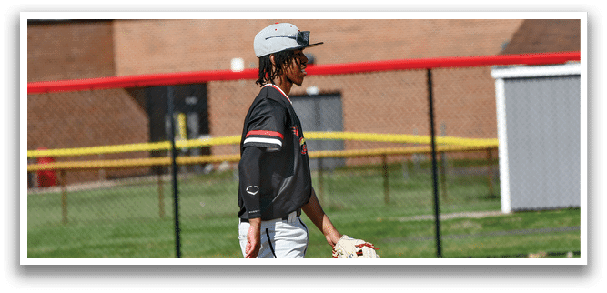 A man wearing a baseball glove. Description generated by AI
