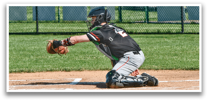 A baseball player is sliding into home plate. Description generated by AI