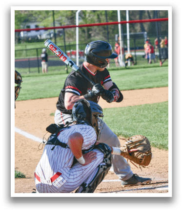 A baseball player is swinging a bat. Description generated by AI