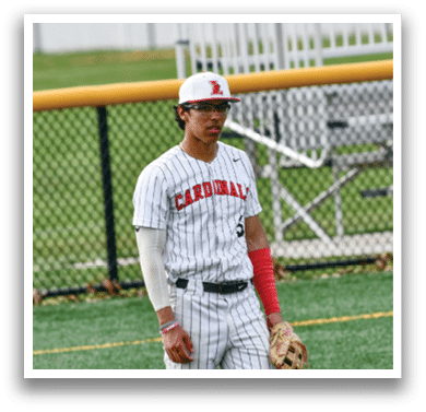 A baseball player in a white and red uniform holding a mitt. Description generated by AI
