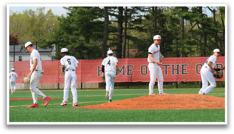 A baseball game is taking place on a field. Description generated by AI