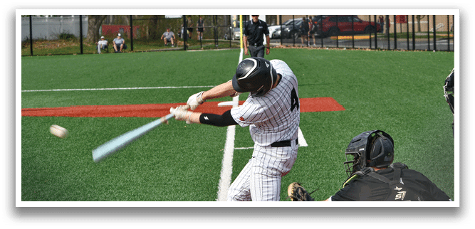 A baseball player is swinging a bat at a ball. Description generated by AI