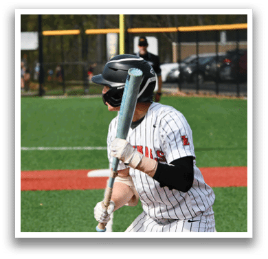 A baseball player is swinging a bat. Description generated by AI