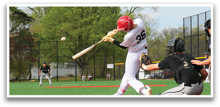 A baseball player is swinging a bat at a ball. Description generated by AI