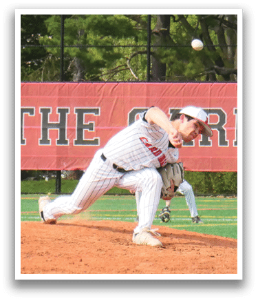 A baseball player is pitching a ball on a field. Description generated by AI
