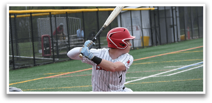 A baseball player is swinging a bat at a ball. Description generated by AI