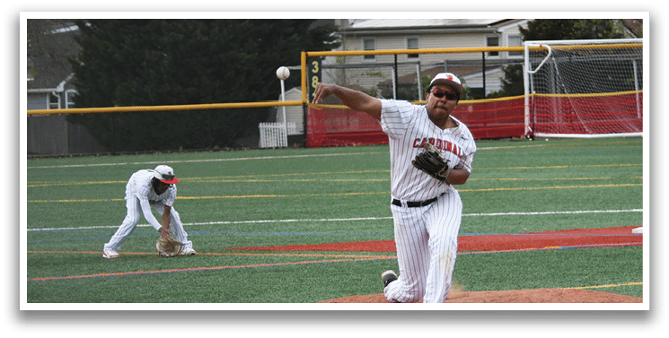 A baseball player is pitching a ball on a field. Description generated by AI