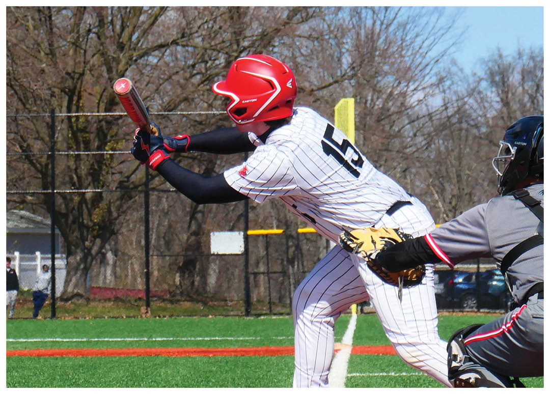 A baseball player is swinging a bat at a ball. Description generated by AI