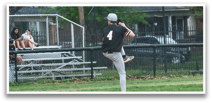 A baseball player is pitching a ball. Description generated by AI