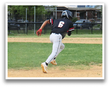 A baseball player is running to first base. Description generated by AI