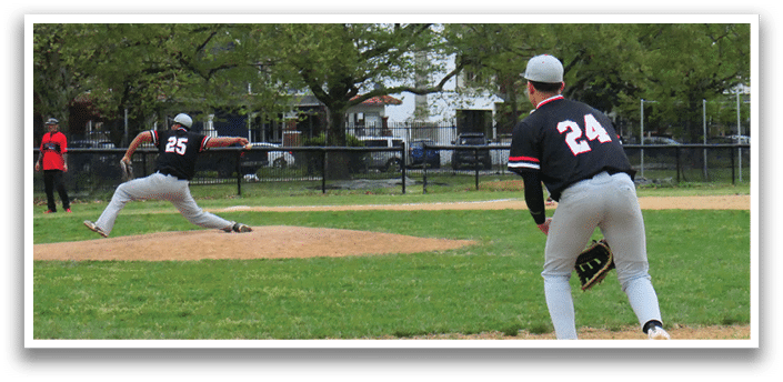 A baseball player in a black shirt and white pants is throwing a ball. Description generated by AI