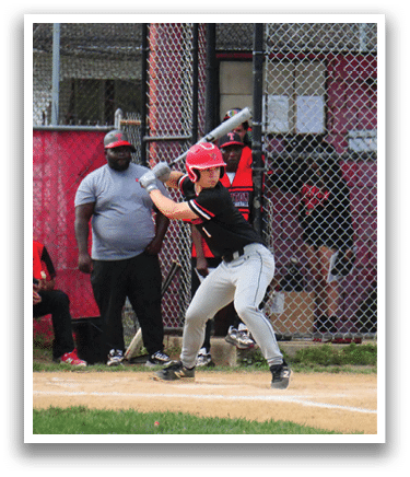 A baseball player is swinging a bat. Description generated by AI