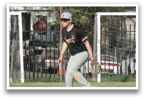 A man running on a field with a baseball glove. Description generated by AI