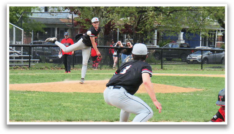A baseball player slides into home base. Description generated by AI