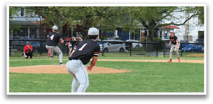 A baseball game is taking place in a park. Description generated by AI