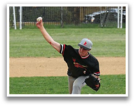 A baseball player in a black shirt and grey pants is pitching a ball. Description generated by AI