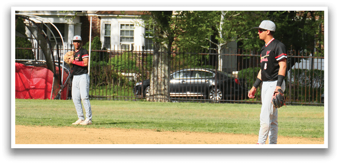 A baseball player is standing on a field with a bat. Description generated by AI