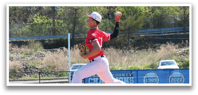 A baseball player in a red shirt and white pants is pitching a ball. Description generated by AI