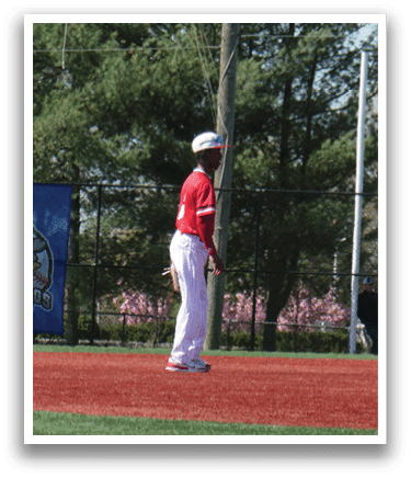 A baseball game is taking place on a field. Description generated by AI
