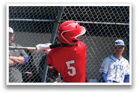 A baseball player swinging a bat. Description generated by AI