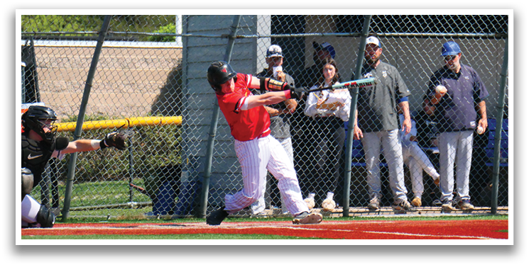 A baseball player is swinging a bat at a ball. Description generated by AI