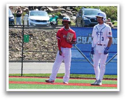 Two baseball players standing on a field. Description generated by AI