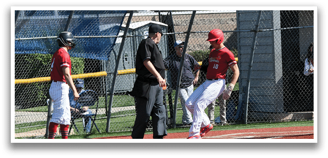 A baseball player is running to first base. Description generated by AI