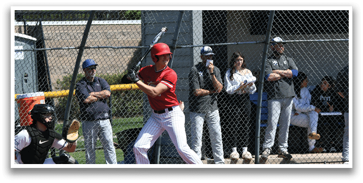 A baseball player is swinging a bat. Description generated by AI