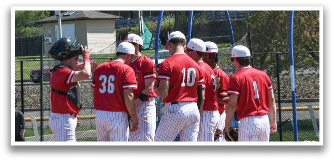 Baseball players wearing red and white uniforms. Description generated by AI