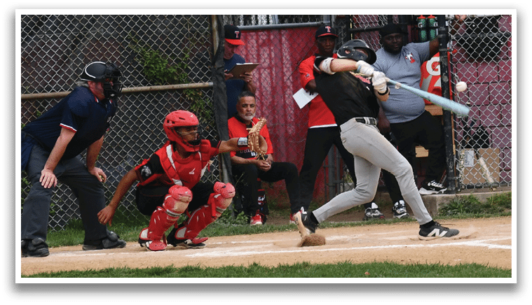 A baseball player is swinging a bat at a ball. Description generated by AI